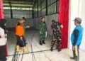 Dandim 0801/Pacitan Letkol Arh Rudi Ariyanto bersama Forkopimca Arjosari dan pengurus meninjau kondisi fisik serta fasilitas Koperasi Desa/Kelurahan Merah Putih (KDKMP) di Kecamatan Arjosari, Kabupaten Pacitan, Jumat (09/10/2026). (Foto: Dok. Kodim 0801/Pacitan)